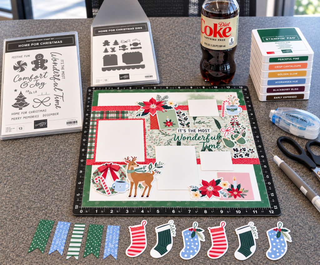 Christmas scrapbook layout in progress with papercrafting supplies and Diet Coke
